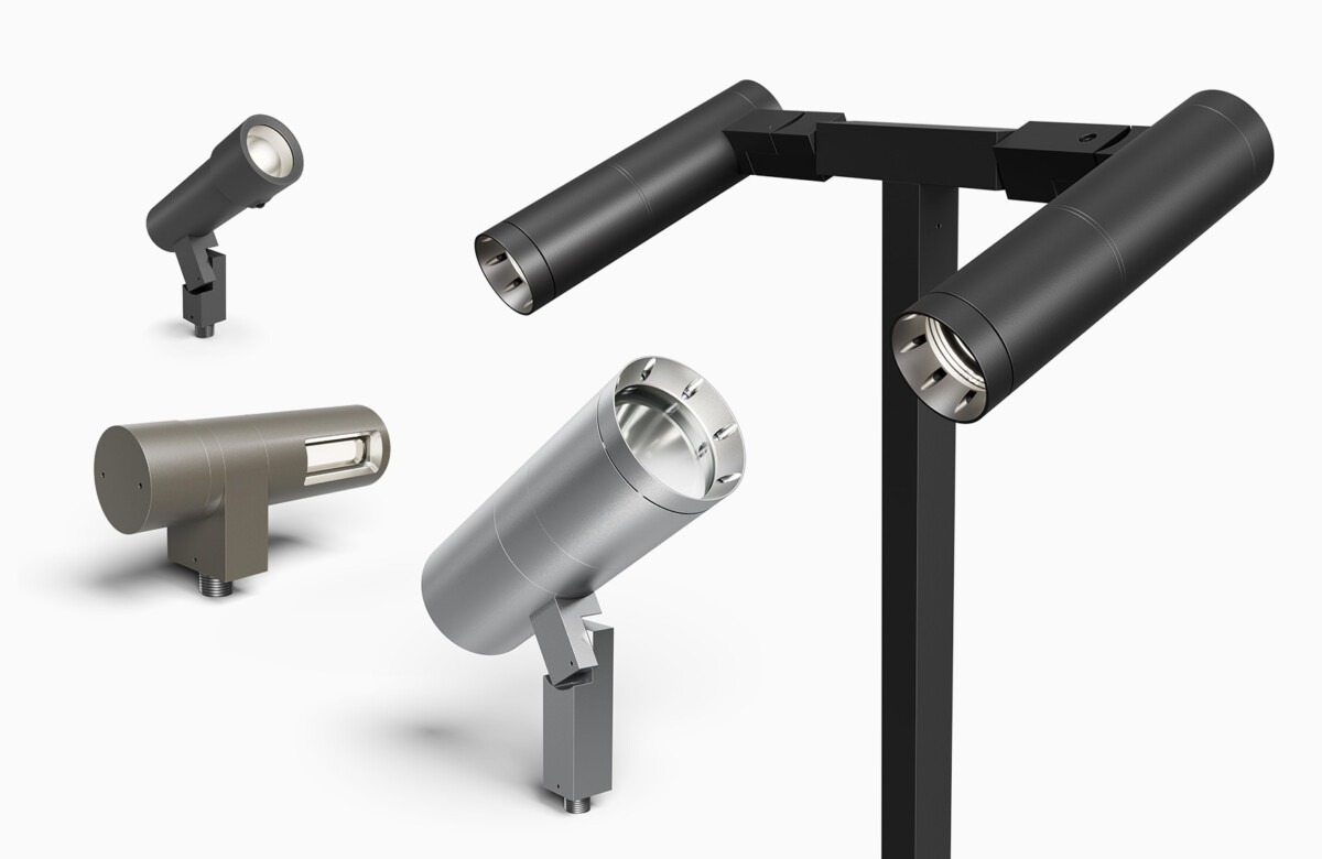 Various 120-volt outdoor landscape lighting fixtures in black and silver finishes